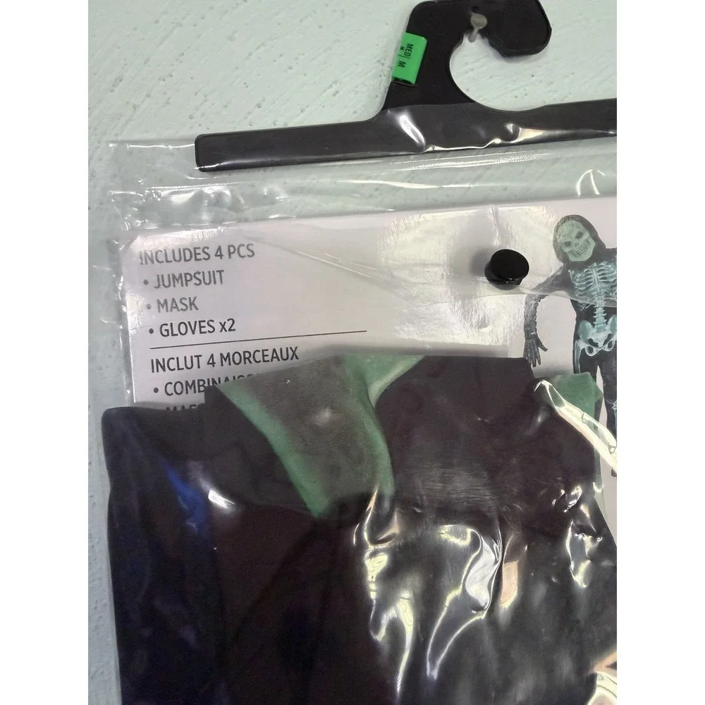 Halloween glow-in-the-dark skeleton costume in size medium (8–10) JUMPSUIT ONLY